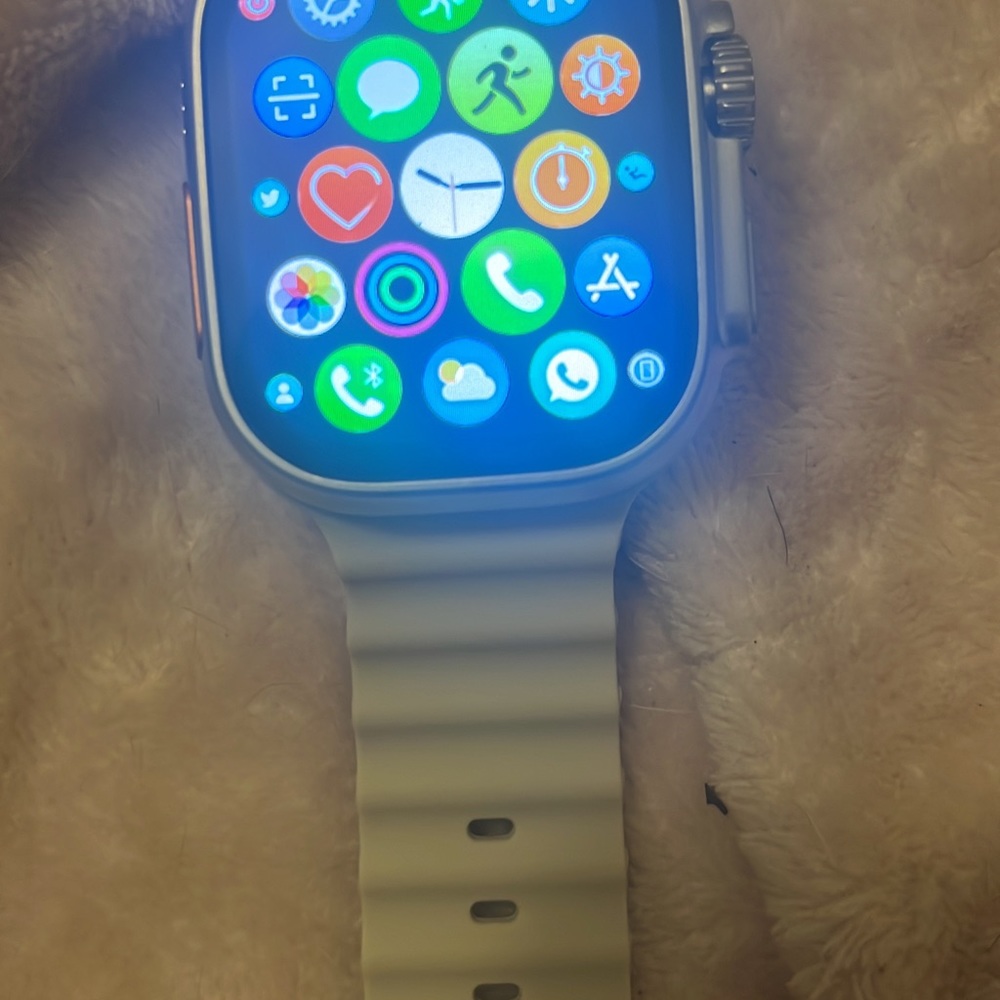 Smart phones they’re all new they come with cream-orange straps and a charger
